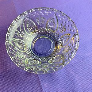 Vintage crystal bowl decorated by fleur-de-lis’s and flower pattern